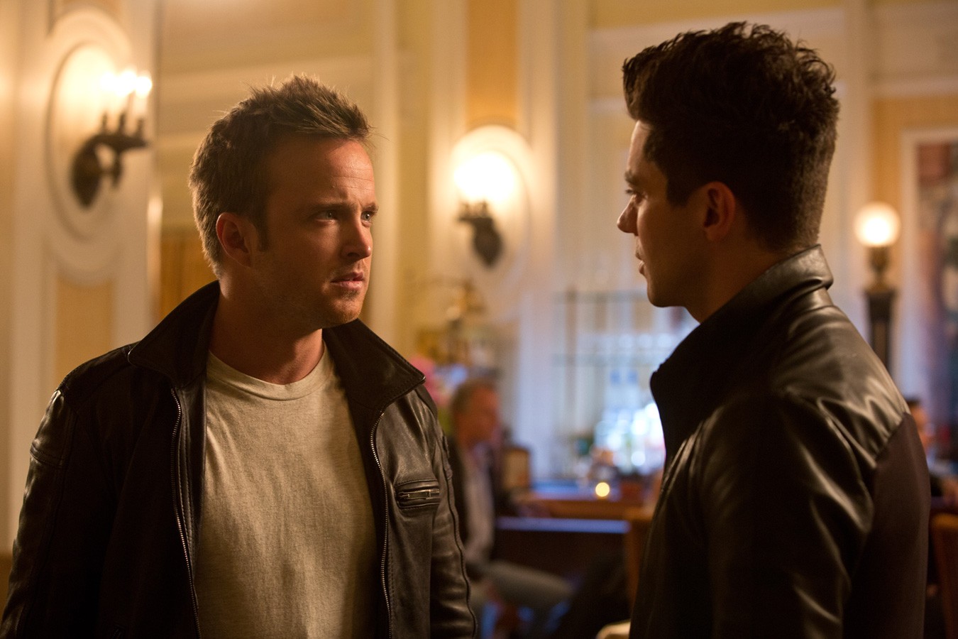 Aaron Paul stars as Tobey Marshall and Dominic Cooper stars as Dino Brewster in Walt Disney Pictures' Need for Speed (2014). Photo credit by Melinda Sue Gordon.
