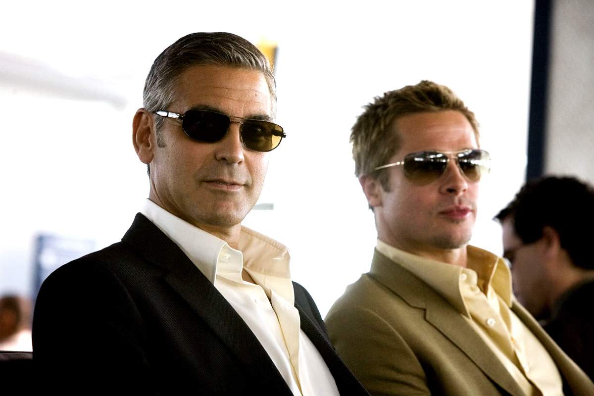 George Clooney as Danny Ocean and Brad Pitt as Rusty Ryan in Warner Bros' Ocean's Thirteen (2007)