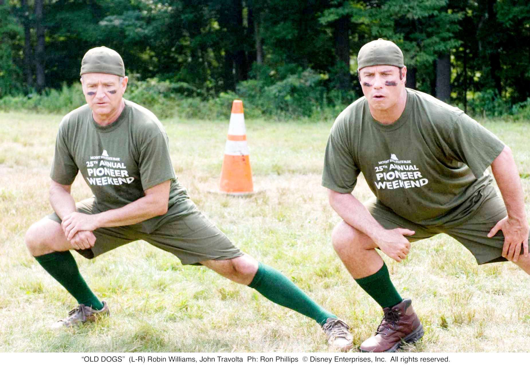 Robin Williams stars as Dan and John Travolta stars as Charlie in Walt Disney Pictures' Old Dogs (2009). Photo credit by Ron Phillips.