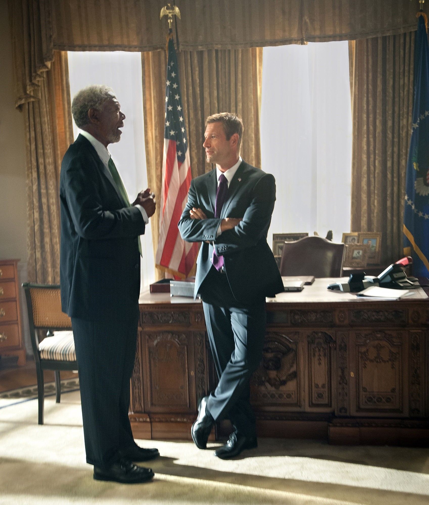 Morgan Freeman stars as Speaker Trumbull and Aaron Eckhart stars as President Benjamin Asher in FilmDistrict's Olympus Has Fallen (2013)