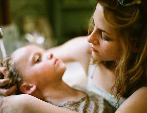 Madison Wolfe stars as Dodie and Kristen Stewart stars as Marylou in IFC Films' On the Road (2012)