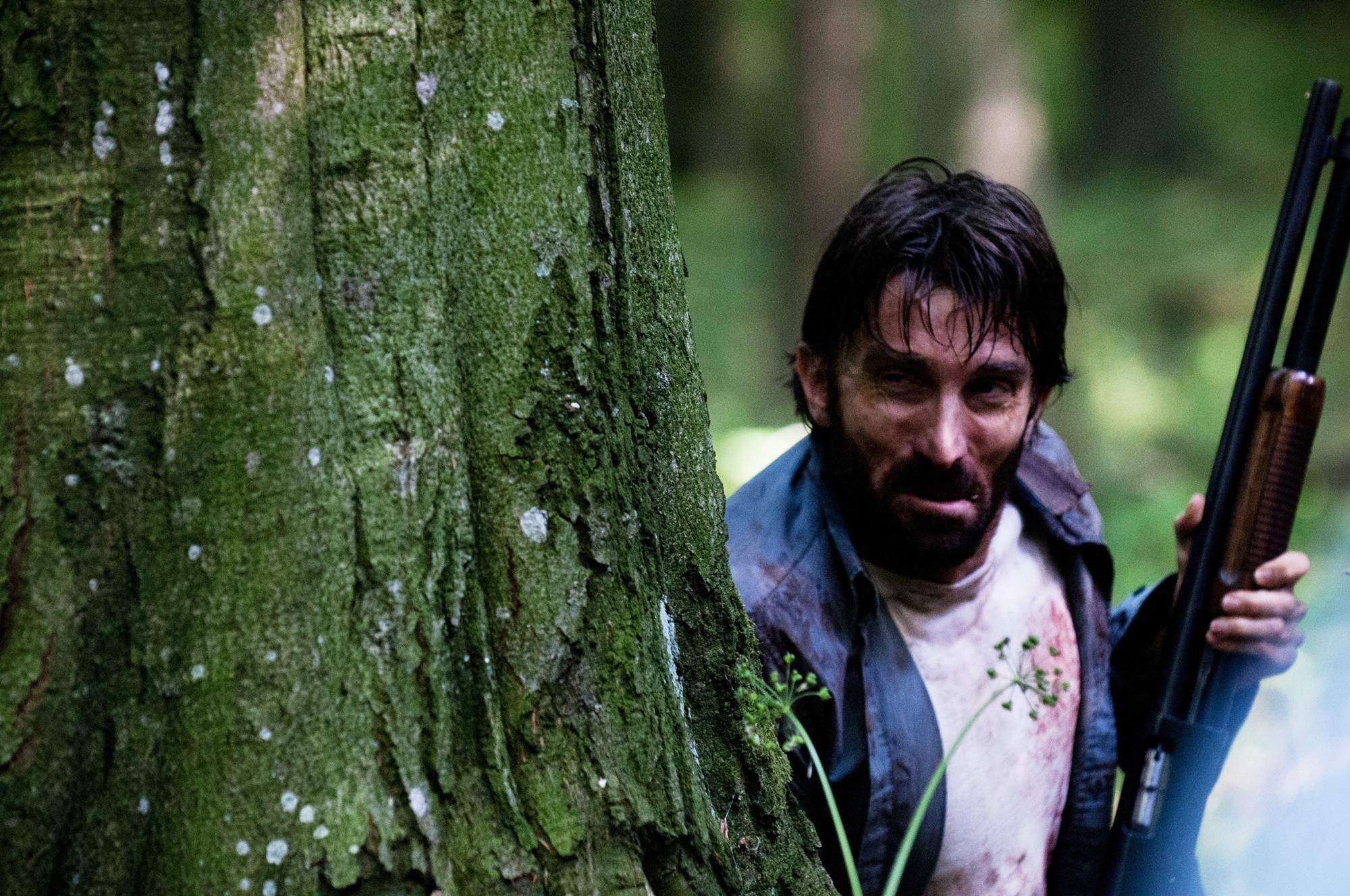 Sharlto Copley stars as John in Tribeca Film's Open Grave (2014)