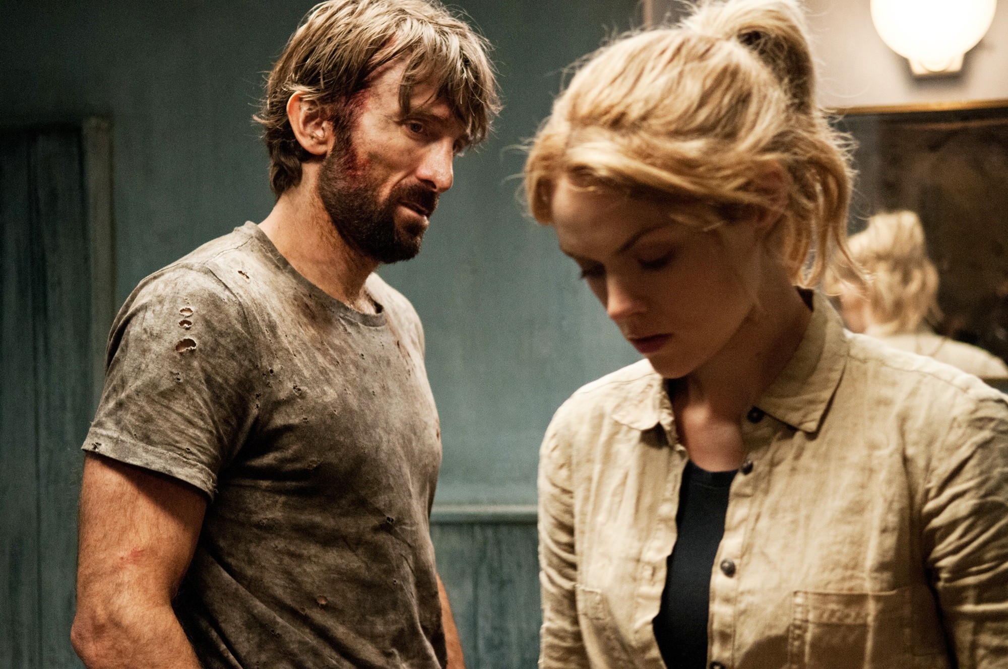 Sharlto Copley stars as John and Erin Richards stars as Sharon in Tribeca Film's Open Grave (2014)