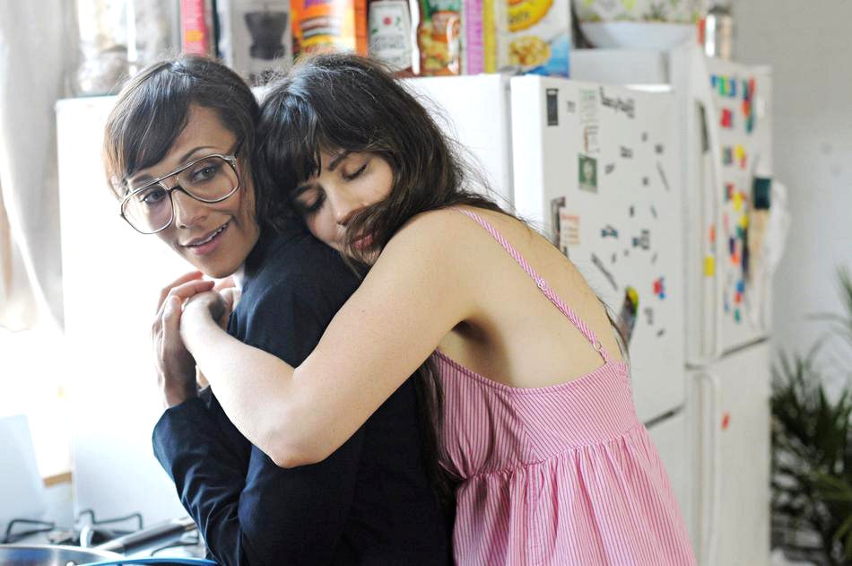 Rashida Jones stars as Cindy and Zooey Deschanel stars as Natalie in The Weinstein Company's Our Idiot Brother (2011)