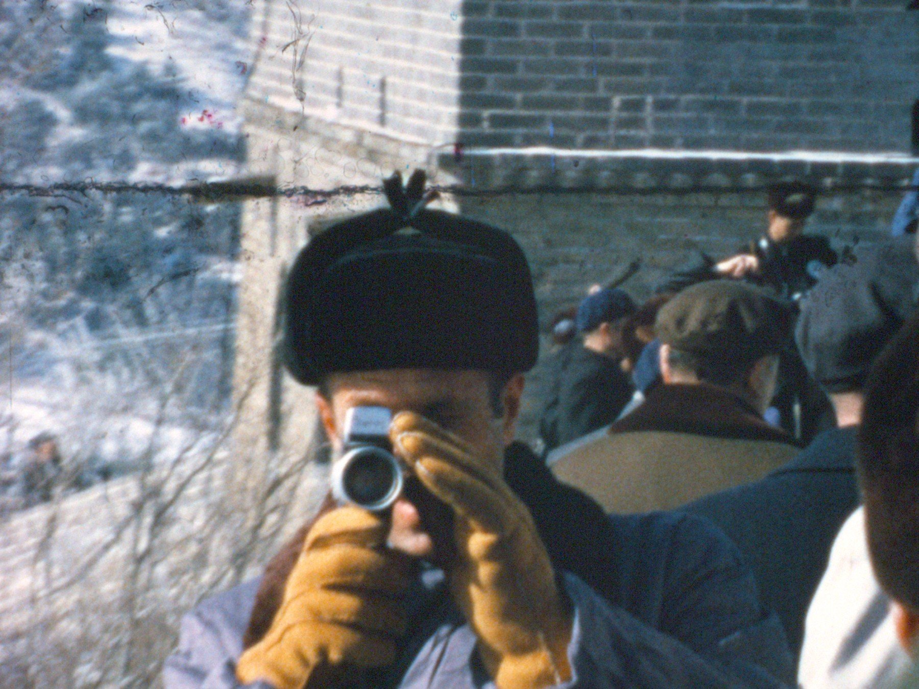 Chief of Staff H.R. 'Bob' Haldeman, one of the amateur filmmakers whose Super 8 footage is showcased in the film, films his assistant filming him at the Great Wall of China (February 1972)