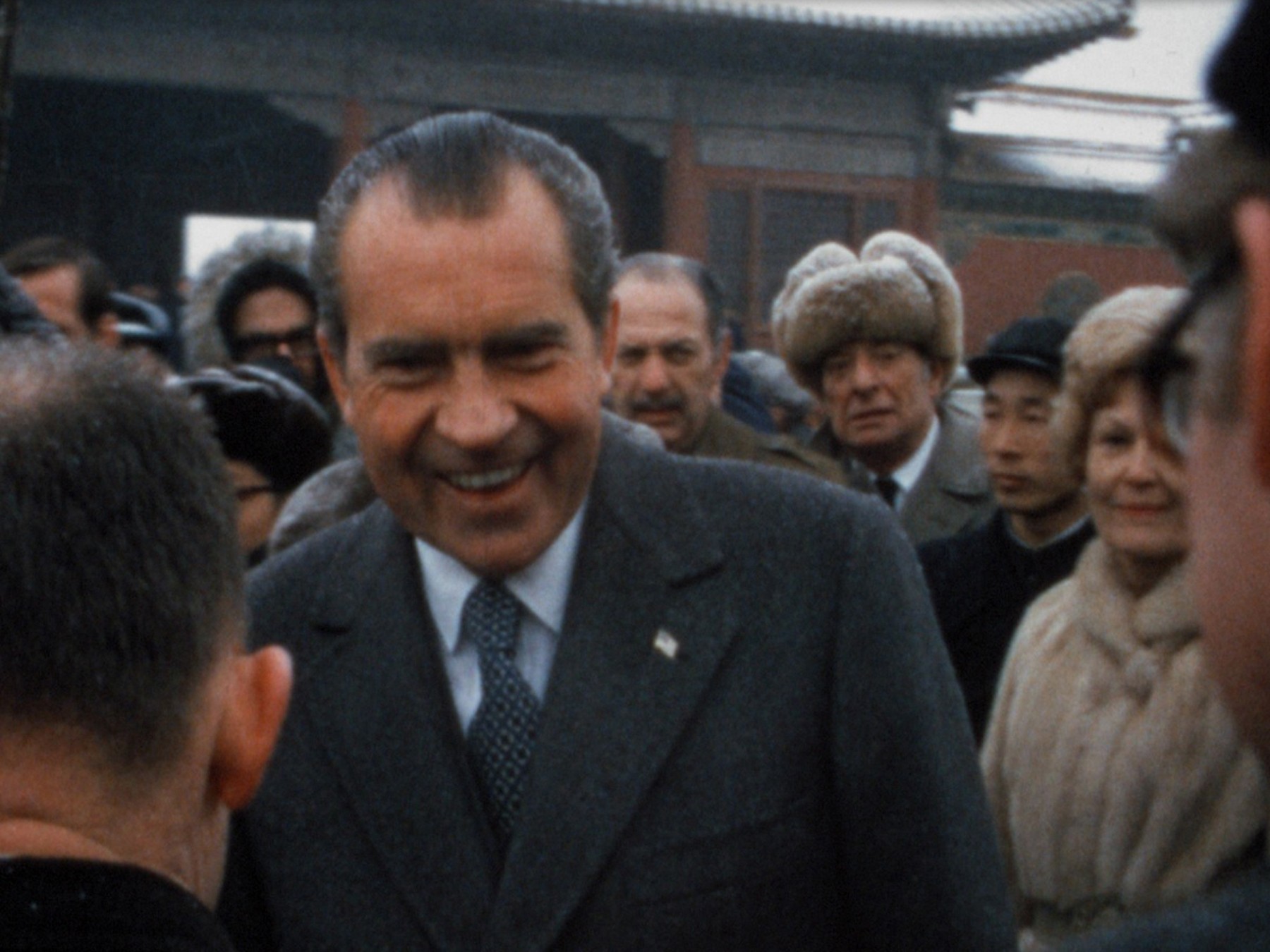 President and Mrs. Nixon mingle with the locals in China while the American press looks on (February 1972)