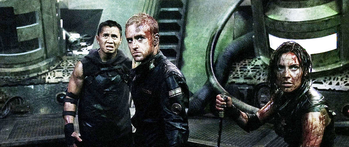 Cung Le, Ben Foster and Antje Traue in Overture Films' Pandorum (2009)