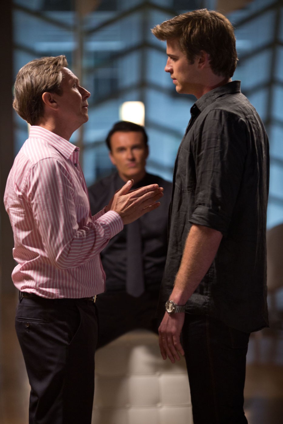 Gary Oldman stars as Nicholas Wyatt and Liam Hemsworth stars as Adam Cassidy in Relativity Media's Paranoia (2013)