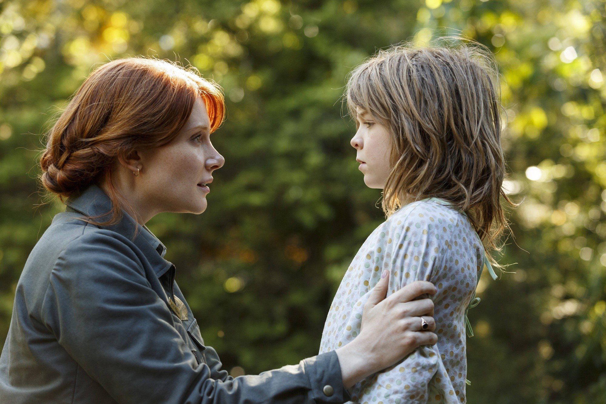 Bryce Dallas Howard stars as Grace and Oakes Fegley stars as Pete in Walt Disney Pictures' Pete's Dragon (2016)