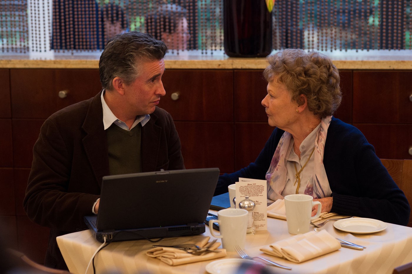 Steve Coogan stars as Martin Sixsmith and Judi Dench stars as Philomena Lee in The Weinstein Company's Philomena (2013)