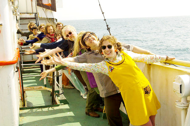 Tom Wisdom, Ike Hamilton, Rhys Darby, Tom Brooke,, Ralph Brown, Tom Sturridge, Philip Seymour Hoffman, Nick Frost and Katherine Parkinson in Focus Features' The Boat That Rocked (2009). Photo credit by Alex Bailey.