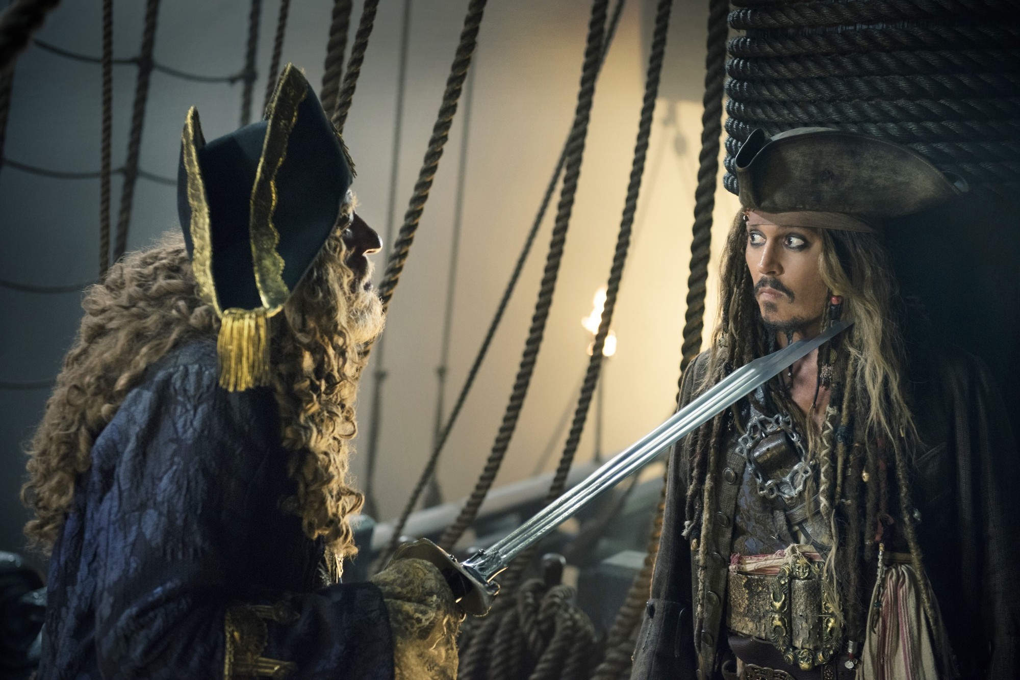 Geoffrey Rush stars as Barbossa and Johnny Depp stars as Captain Jack Sparrow in Walt Disney Pictures' Pirates of the Caribbean: Dead Men Tell No Tales (2017)