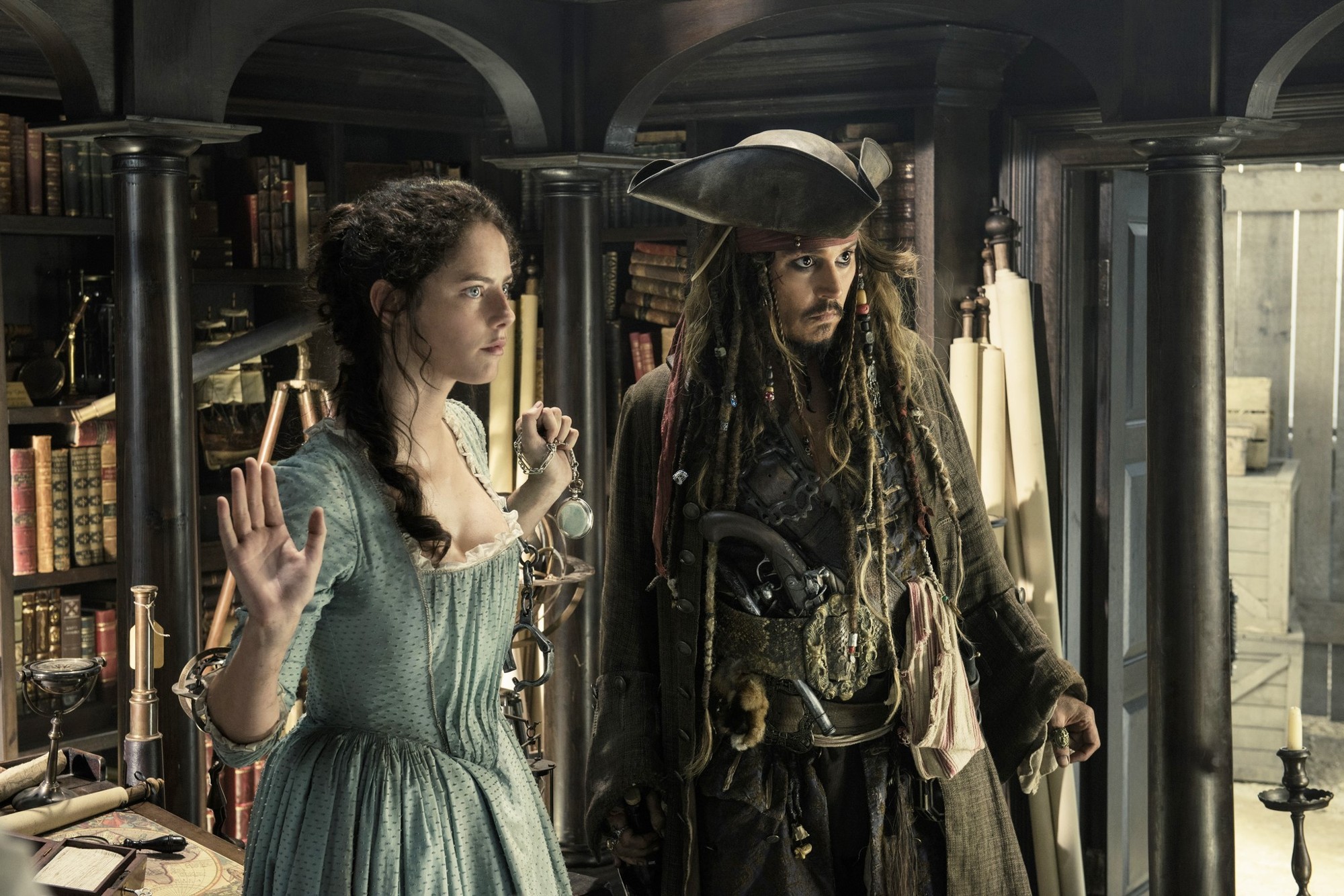 Kaya Scodelario stars as Carina Smyth and Johnny Depp stars as Captain Jack Sparrow in Walt Disney Pictures' Pirates of the Caribbean: Dead Men Tell No Tales (2017)