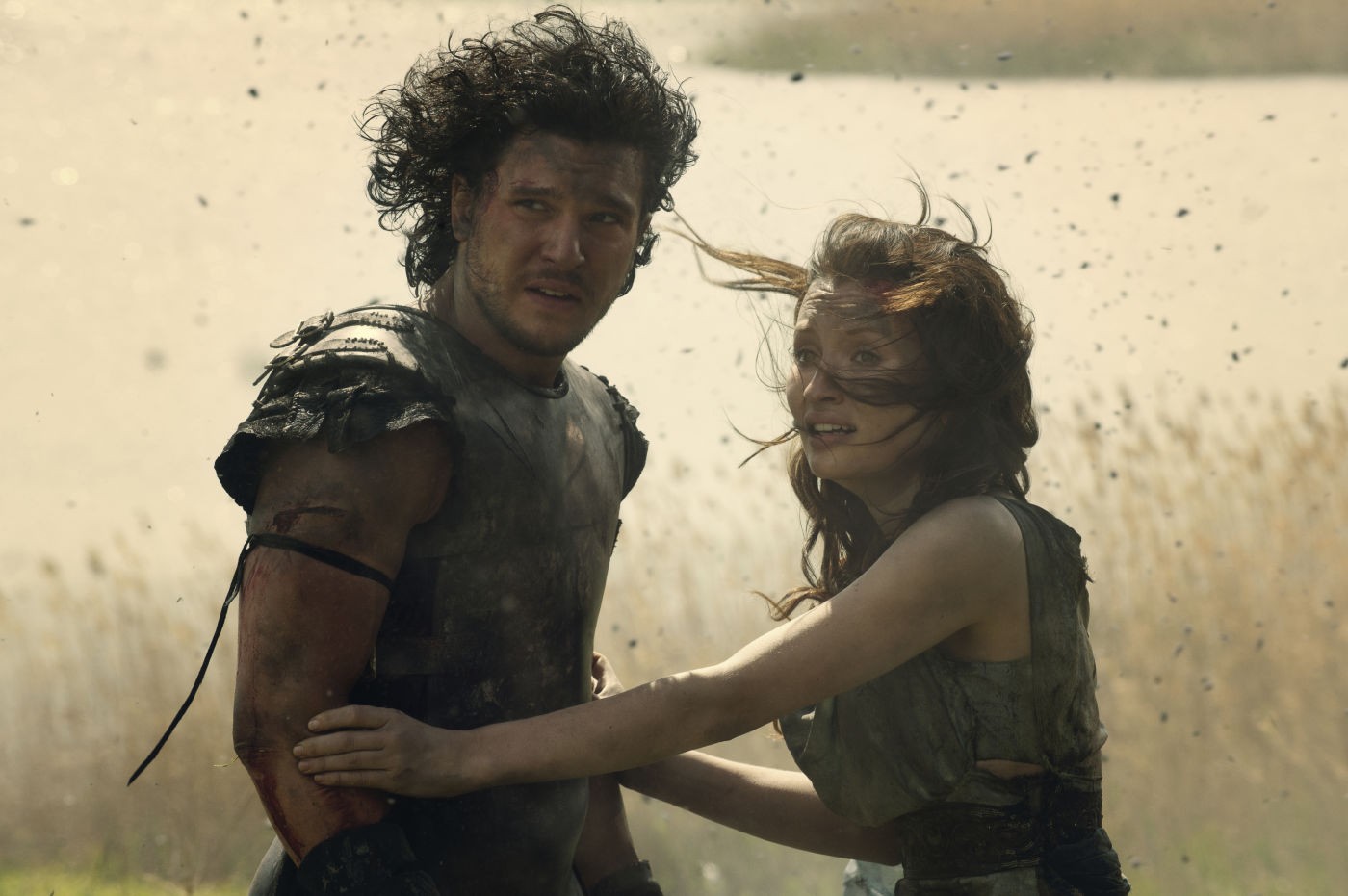 Kit Harington stars as Milo and Emily Browning stars as Cassia in TriStar Pictures' Pompeii (2014)