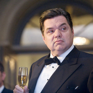 Oliver Platt stars as 	Carl Anheuser in Columbia Pictures' 2012 (2009)