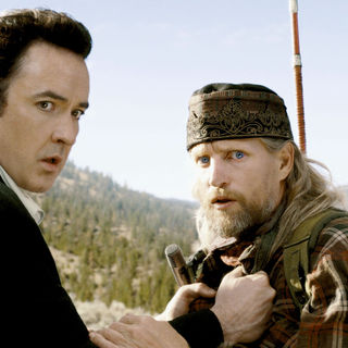 John Cusack stars as Jackson Curtis and Woody Harrelson stars as Charlie Frost in Columbia Pictures' 2012 (2009)