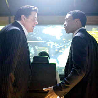 Oliver Platt stars as Carl Anheuser and Chiwetel Ejiofor stars as Adrian Helmsley in Columbia Pictures' 2012 (2009)