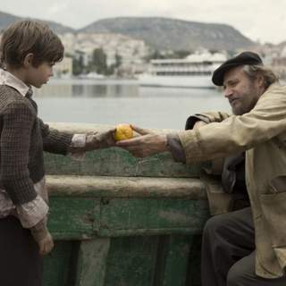 Rade Serbedzija as Athos and Robbie Kay as Young Jakob in Samuel Goldwyn Films' Fugitive Pieces (2008)