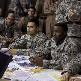 MICHAEL PENA (left center) and DEREK LUKE (right center) star in United Artists/MGM Pictures' LIONS FOR LAMBS (2007). Photo by: David James.