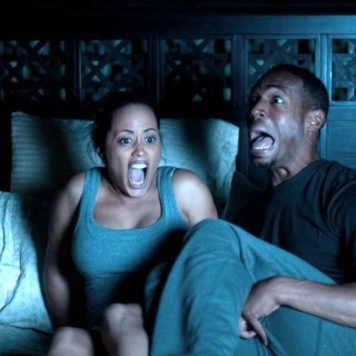 Essence Atkins stars as Keisha and Marlon Wayans stars as Malcolm in Open Road Films' A Haunted House (2013)