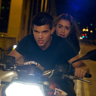 Taylor Lautner stars as Nathan and Lily Collins stars as Karen in Lionsgate Films' Abduction (2011)