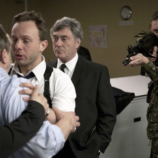 Sebastian Street stars as Agent Moss and Mark Hamill stars as Malcolm in Image Entertainment's Airborne (2012)
