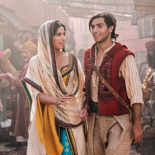 Naomi Scott stars as Jasmine and Mena Massoud stars as Aladdin in Walt Disney Pictures' Aladdin (2019)