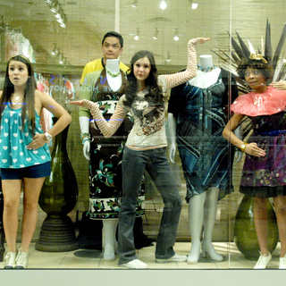 Ally (Nina Dobrev) and friends hide from security in The American Mall (2008)