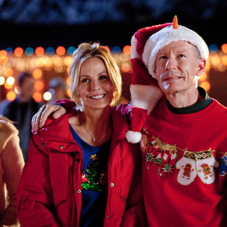Eloise DeJoria stars as Laura and Lyle Lovett stars as Griffin in Lionsgate Films' Angels Sing (2013)
