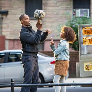 Jamie Foxx stars as Will Stacks and Quvenzhane Wallis stars as Annie in Columbia Pictures' Annie (2014). Photo credit by Barry Wetcher.