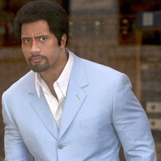The Rock as Elliot Wilhelm in MGM's Be Cool (2005)