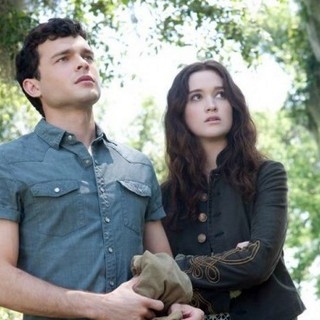 Alden Ehrenreich stars as Ethan Wate and Alice Englert stars as Lena Duchaness in Warner Bros. Pictures' Beautiful Creatures (2013)
