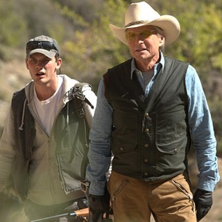 Jeremy Irvine stars as Ben and Michael Douglas stars as Madec in Roadside Attractions' Beyond the Reach (2015)