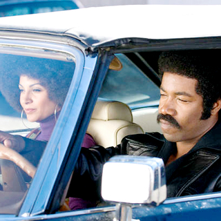 Salli Richardson stars as Gloria and Michael Jai White stars as Black Dynamite in Apparition's Black Dynamite (2009). Photo credit by Prashant Gupta.