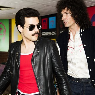 Rami Malek stars as Freddie Mercury and Gwilym Lee stars as Brian May in 20th Century Fox's Bohemian Rhapsody (2018)