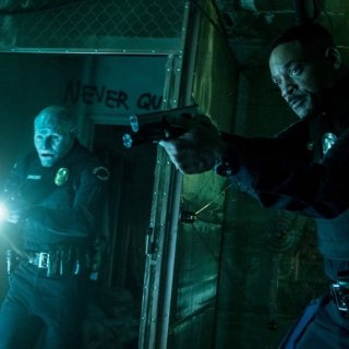 Joel Edgerton stars as Nick Jakoby and Will Smith stars as Daryl Ward in Netflix's Bright (2017)