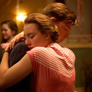 Domhnall Gleeson stars as Jim Farrell and Saoirse Ronan stars as Ellis Lacey in Fox Searchlight Pictures' Brooklyn (2015)