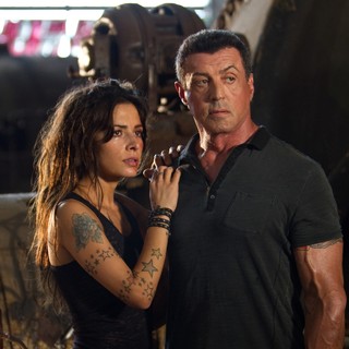 Sarah Shahi stars as Lisa Bobo and Sylvester Stallone stars as Jimmy Bobo in Warner Bros. Pictures' Bullet to the Head (2012)