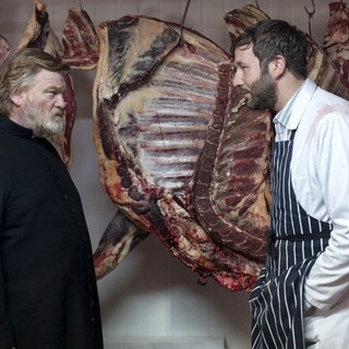 Brendan Gleeson (stars as Father James Lavelle) and Chris O'Dowd in Fox Searchlight Pictures' Calvary (2014)