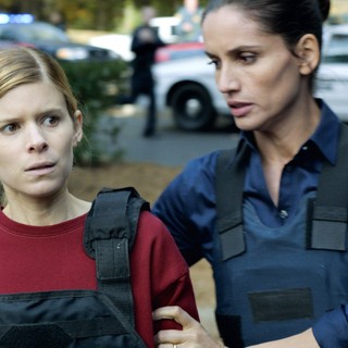 Kate Mara stars as Ashley Smith and Leonor Varela stars as Sergeant Carmen Sandoval in Paramount Pictures' Captive (2015)