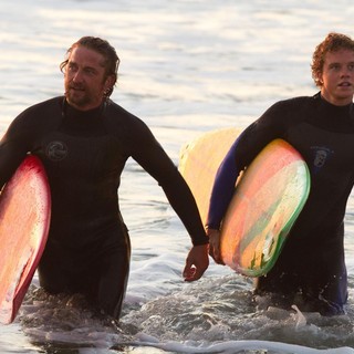 Gerard Butler stars as Frosty Hesson and Jonny Weston stars as Jay Moriarity in 20th Century Fox's Chasing Mavericks (2012)