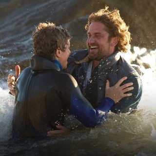 Jonny Weston stars as Jay Moriarity and Gerard Butler stars as Frosty Hesson in 20th Century Fox's Chasing Mavericks (2012)