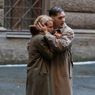 Noomi Rapace stars as Raisa Demidov and Tom Hardy stars as Leo Demidov in Summit Entertainment's Child 44 (2015)