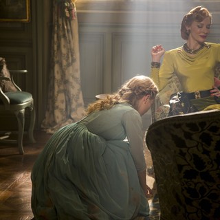 Lily James stars as Cinderella and Cate Blanchett stars as Lady Tremaine in Walt Disney Pictures' Cinderella (2015). Photo credit by Jonathan Olley.