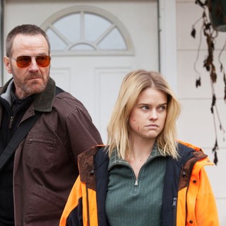 Bryan Cranston stars as Topo and Alice Eve stars as Chloe in Samuel Goldwyn Films' Cold Comes the Night (2014)