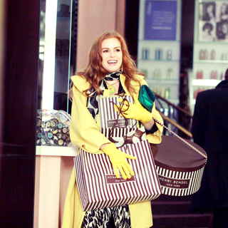 Isla Fisher stars as Rebecca Bloomwood in Walt Disney Pictures' Confessions of a Shopaholic (2009). Photo credit by Robert Zuckerman.