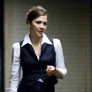 MAGGIE GYLLENHAAL stars as Rachel Dawes in Warner Bros. Pictures' and Legendary Pictures' action drama 