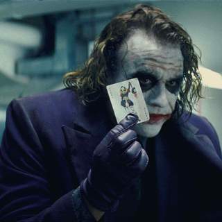 HEATH LEDGER stars as Joker in Warner Bros. Pictures' and Legendary Pictures' action drama 