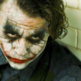 HEATH LEDGER stars as Joker in Warner Bros. Pictures' and Legendary Pictures' action drama 