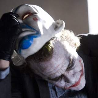 HEATH LEDGER stars as Joker in Warner Bros. Pictures' and Legendary Pictures' action drama 